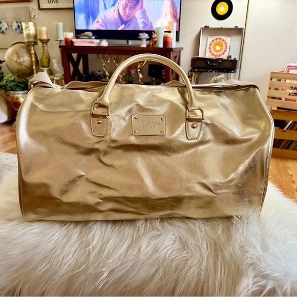 Michael Kors Handbags - Michael Kors Gold Metallic Weekender Duffel Bag